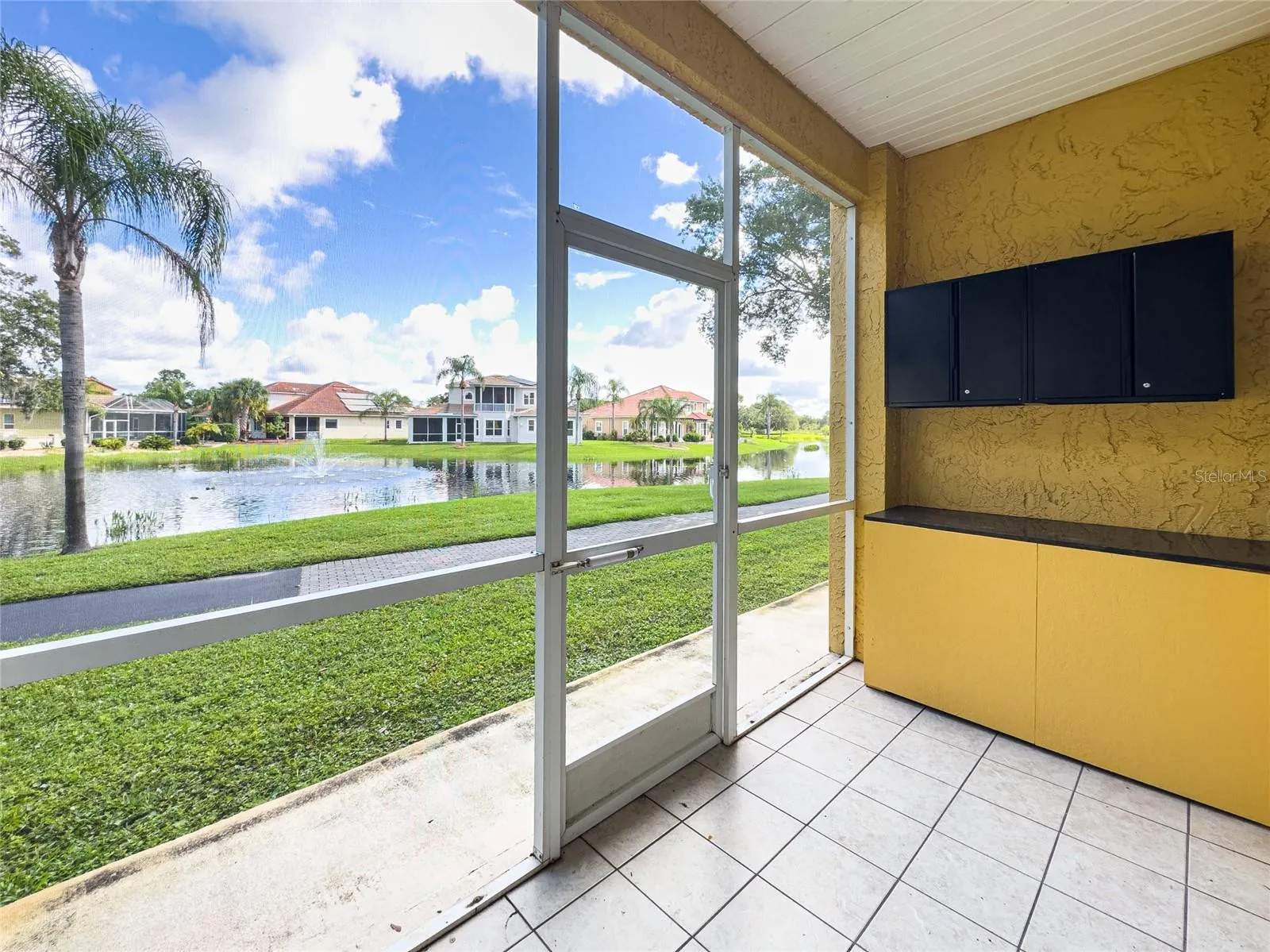 Custom cabinets on screen/covered lanai.