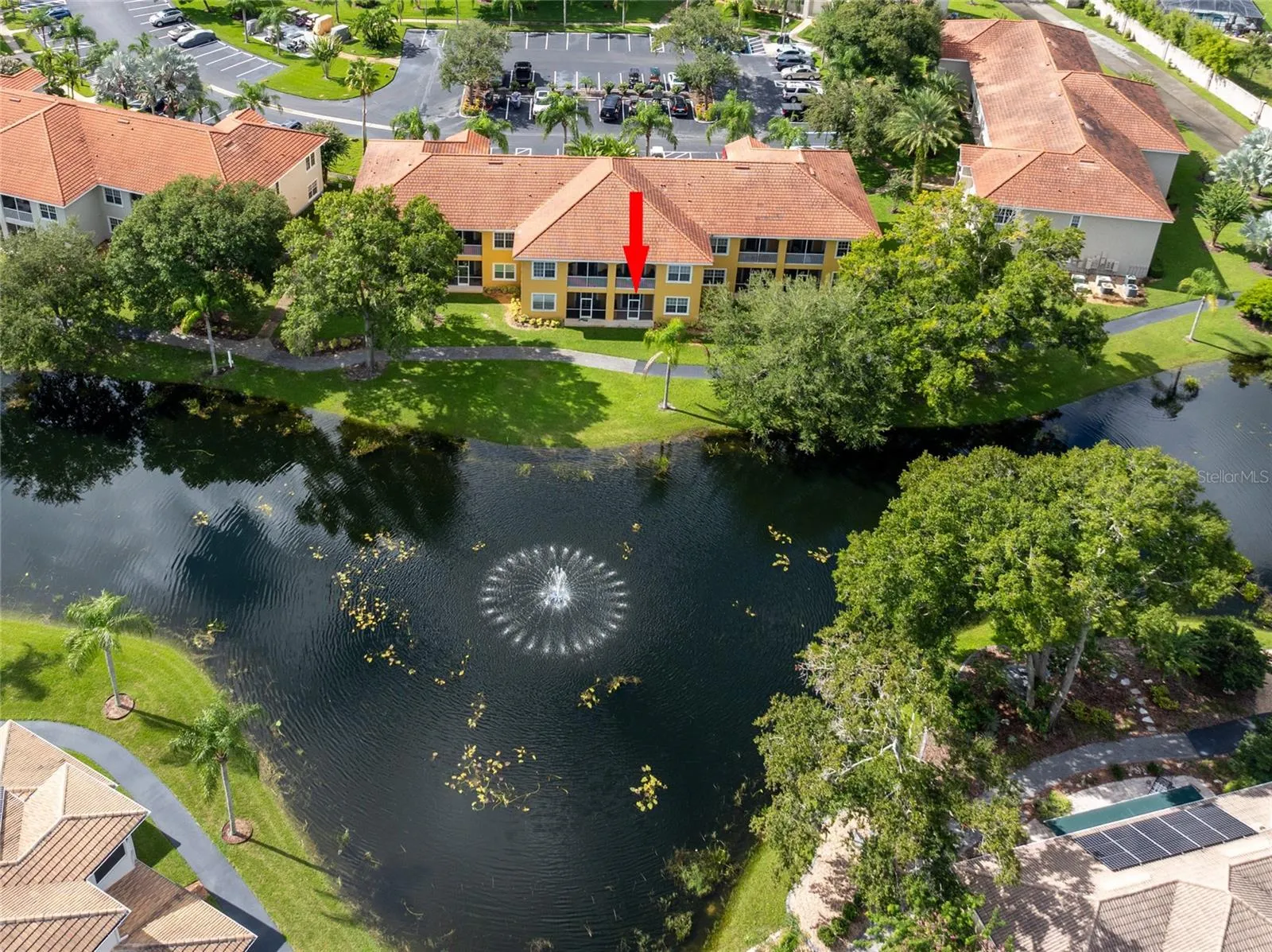 Great water view from screened/covered lanai.  Showing fountain.