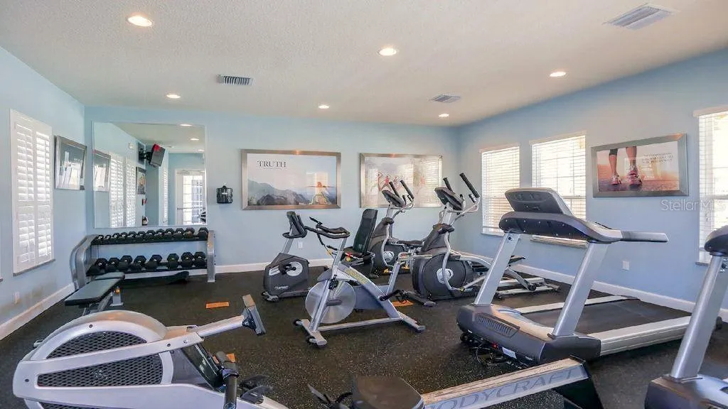 Fitness Center — Community fitness center offers a variety of cardio and exercise equipment for owners and guests.