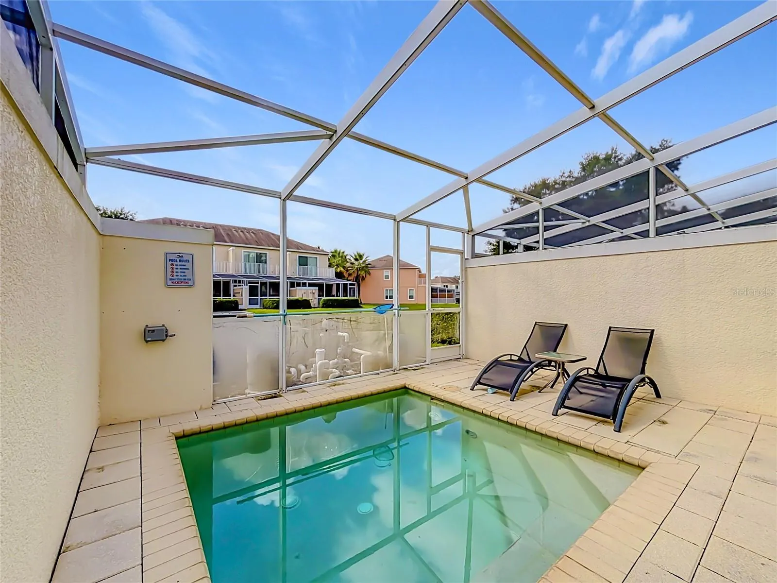 South-Facing Pool — Desirable south-facing private pool offers excellent sun exposure throughout the day—an especially sought-after feature for a Florida vacation home.