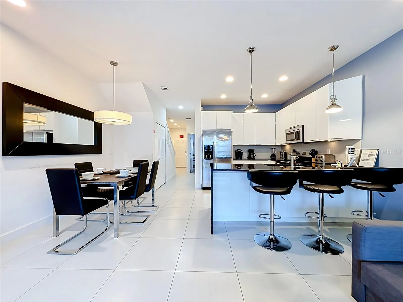 Open Floor Plan — Open kitchen, dining, and living areas create a spacious main level designed for easy gathering and entertaining.