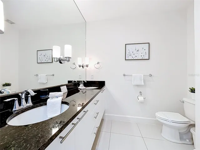 Primary Bathroom — Private primary bath with dual-sink vanity, generous counter space, and clean contemporary finishes.
