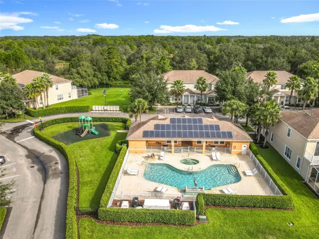 Community Amenities — Aerial view of the community amenity center featuring the resort-style pool and surrounding recreation areas.