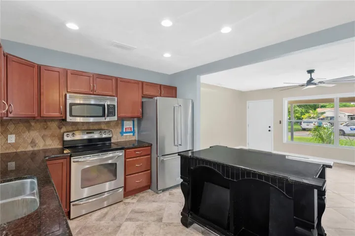 Open-concept kitchen and living area.