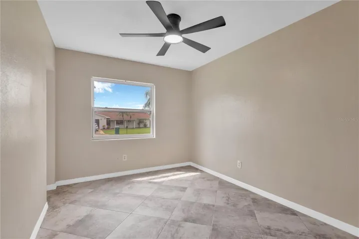 Bedroom # 2 has a built-in closet, new window, new light &amp; fan, fresh paint and new flooring.