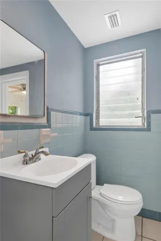 Second Full bathroom with Shower is accessible from the Bonus Room and from inside the Garage.