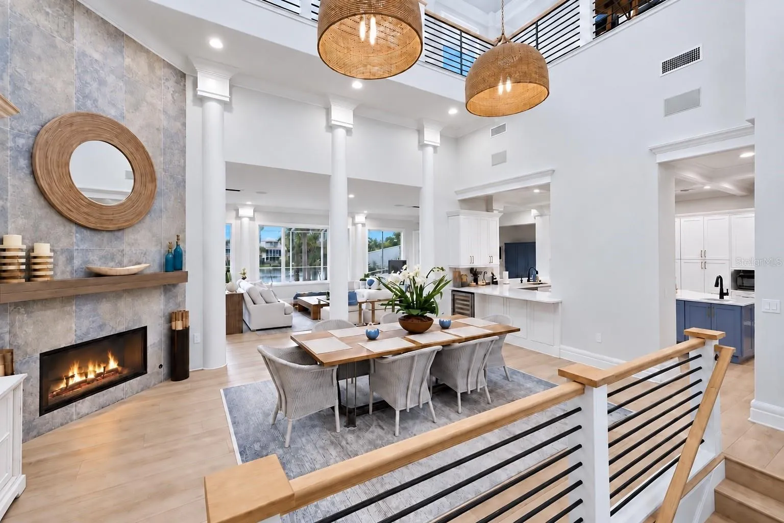 Dining room with water views in the front and back