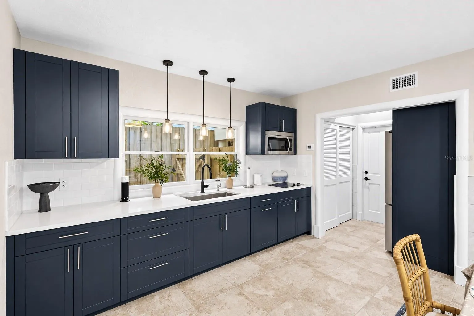 Ground level, private kitchen, three kitchens total in this home