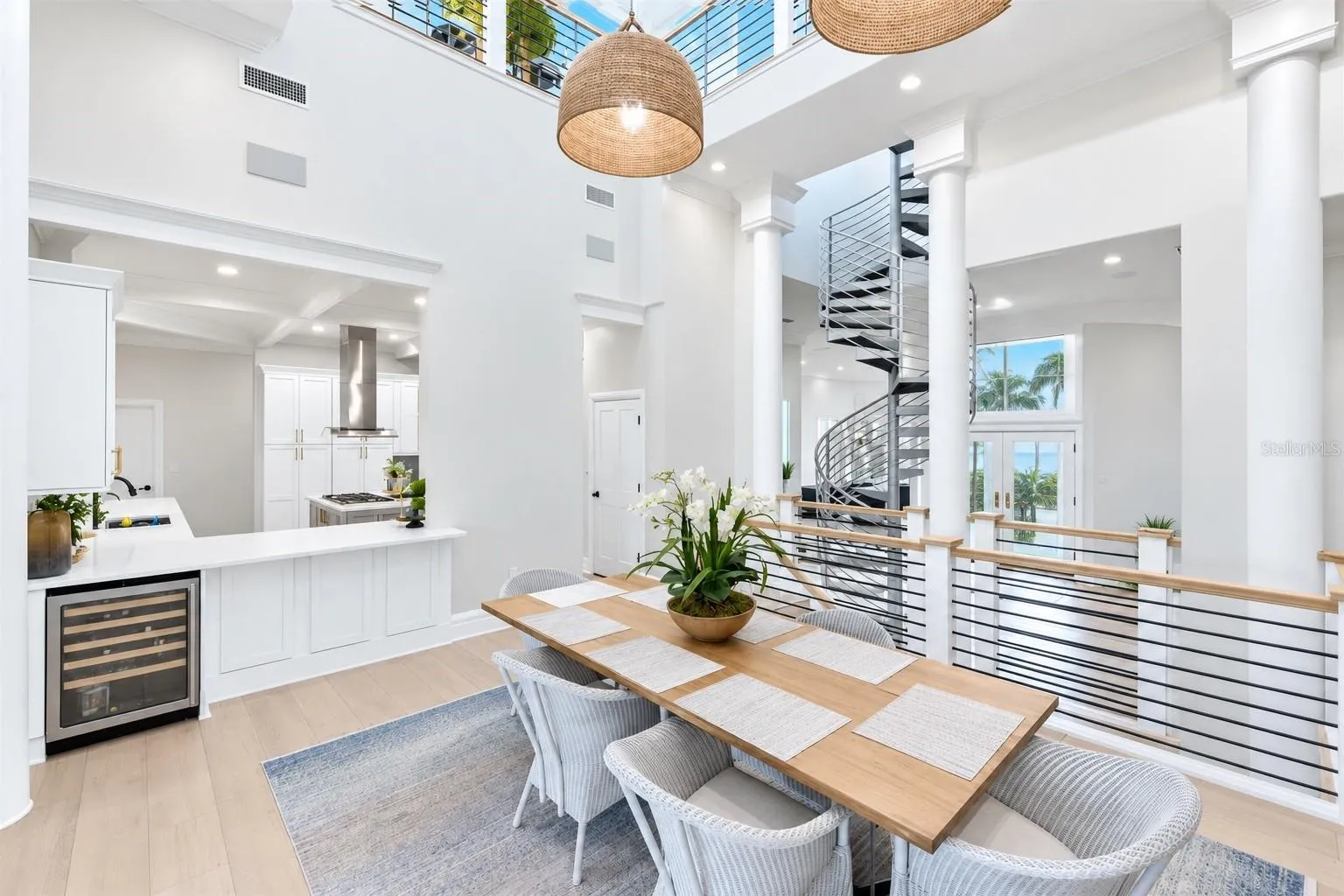 Dining room with water views in the front and back