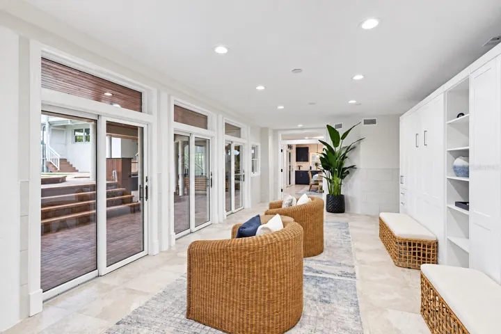 wo murphy beds, ground level, overlooking patio and pool