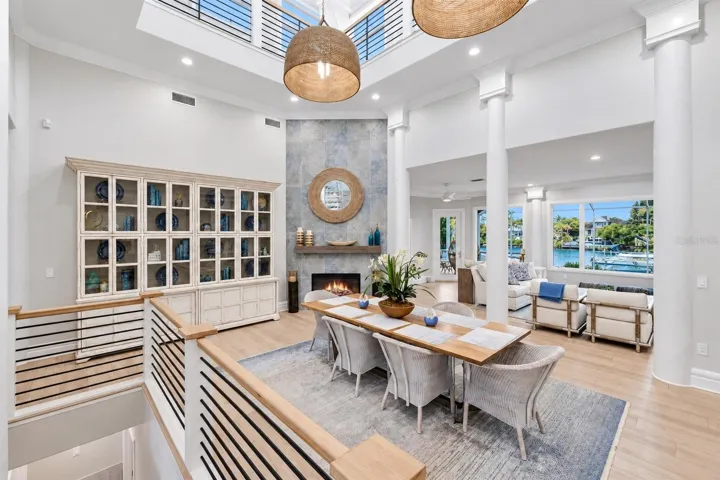 Dining room with water views in the front and back