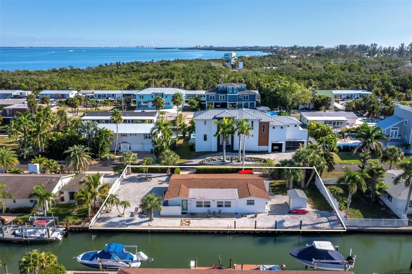 Situated on a very waterfront large lot, with plenty of room for a side yard pool, this home has many options!