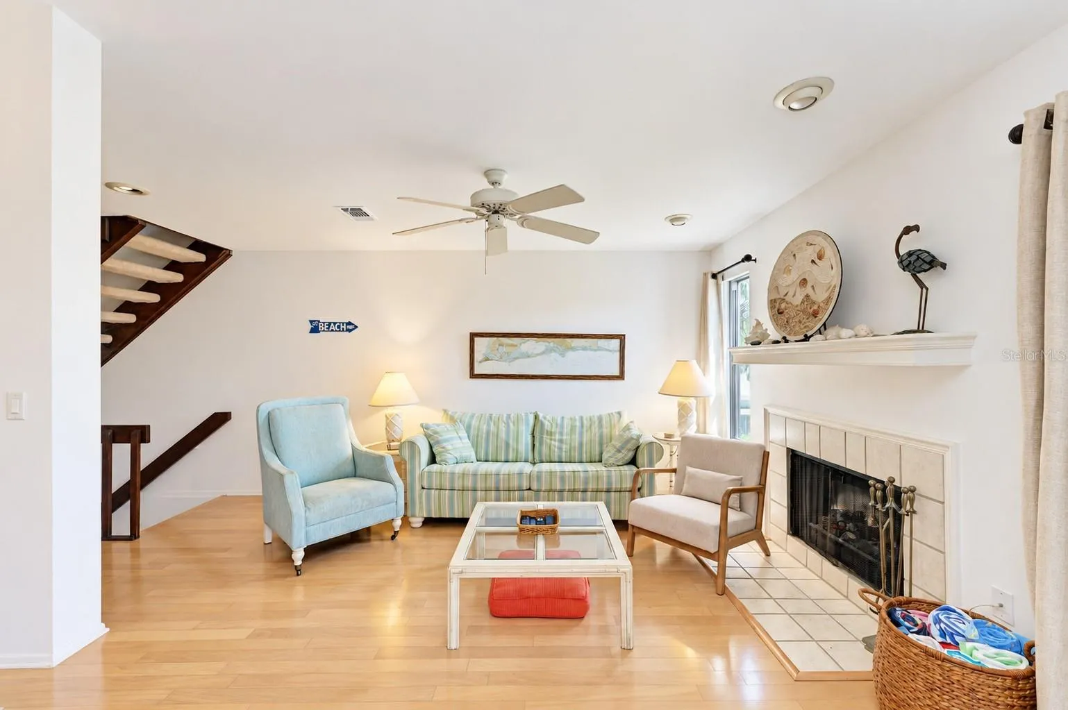 living room with wood burning fireplace