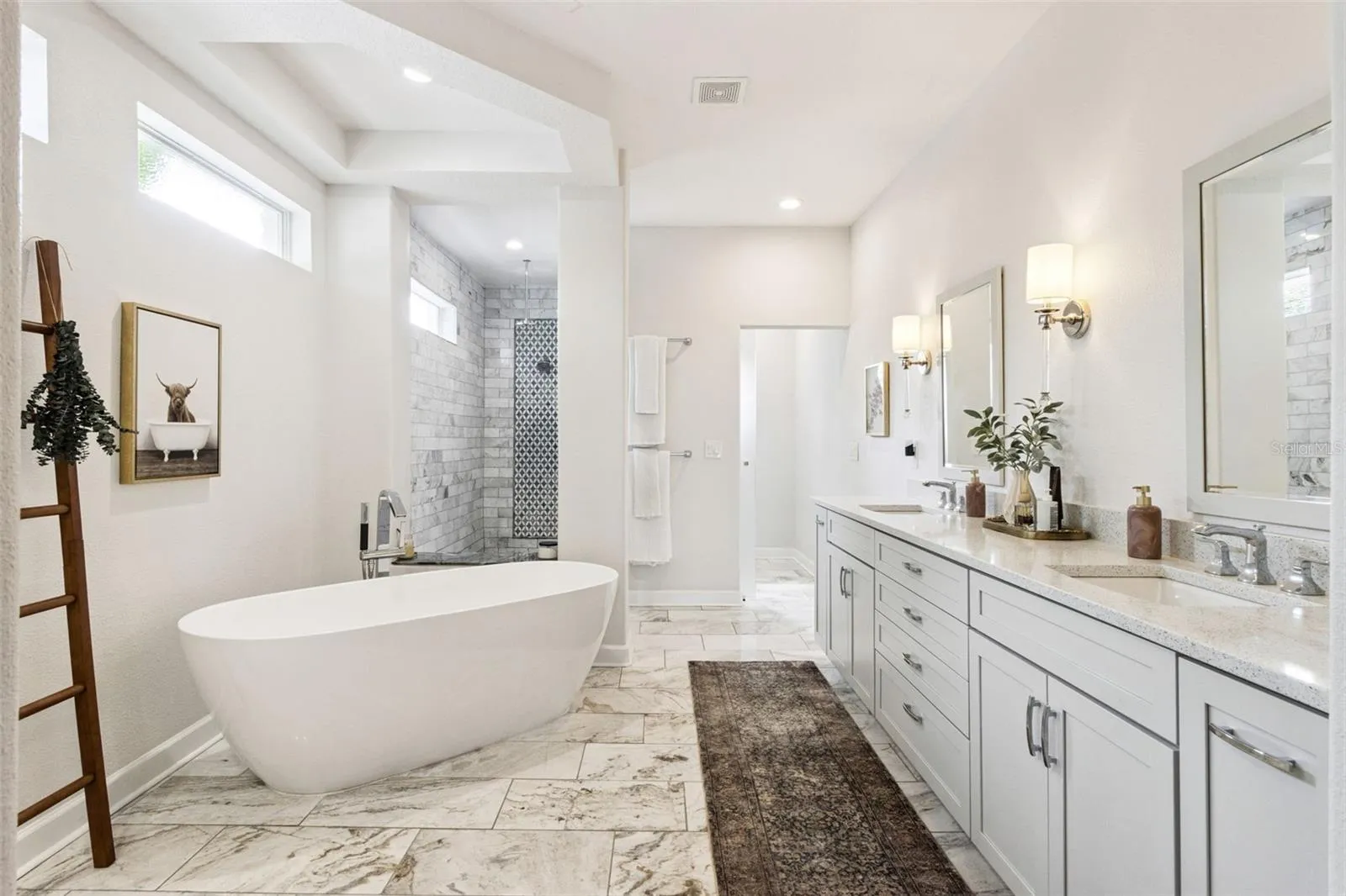 Stunning primary bath with separate soaking tub and shower