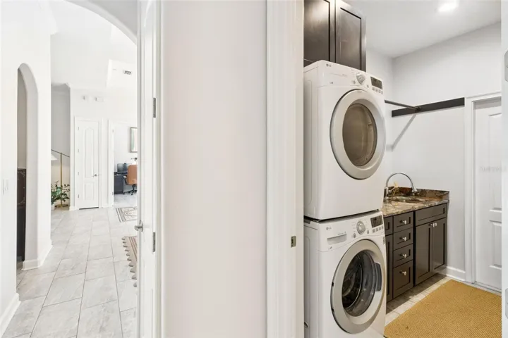 First floor laundry room with custom cabinets