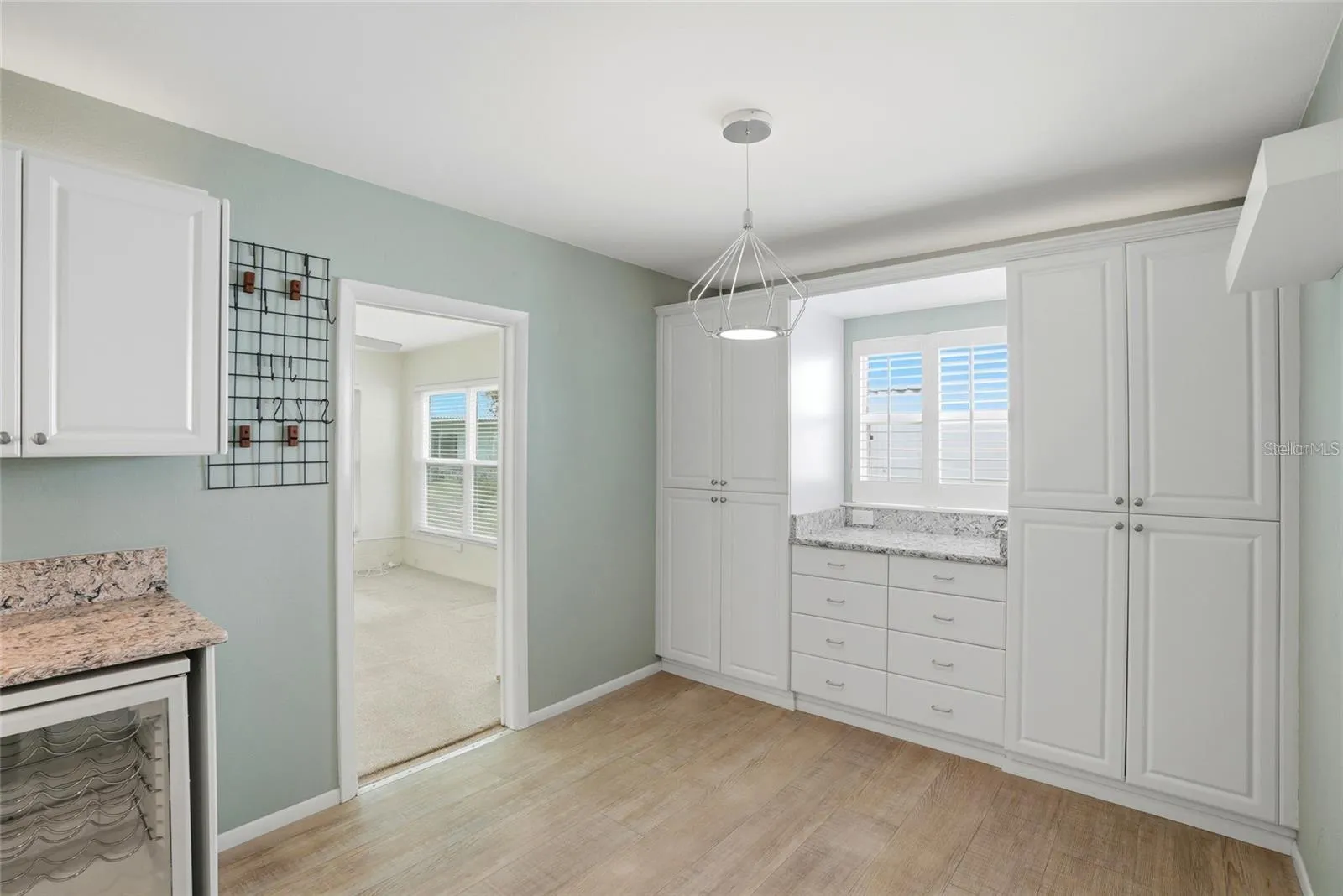 The home office is off of the kitchen.