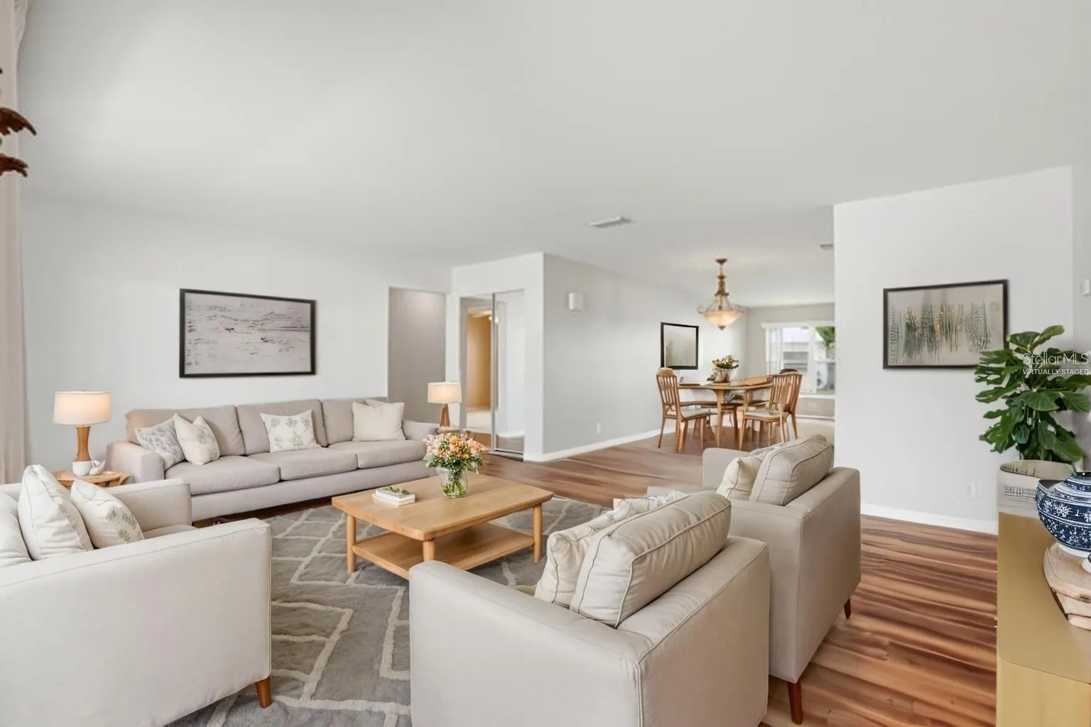 Another virtually staged living room photo.