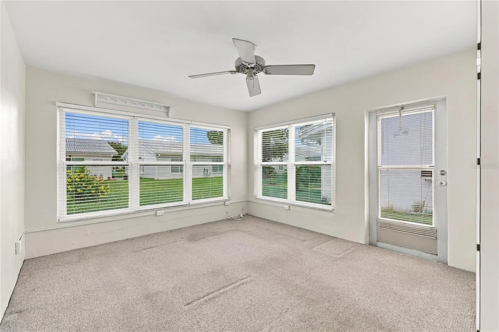 Screened in patio was turned into a bonus room.