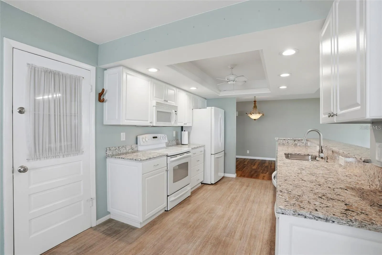 The 2 car garage is off of the kitchen.