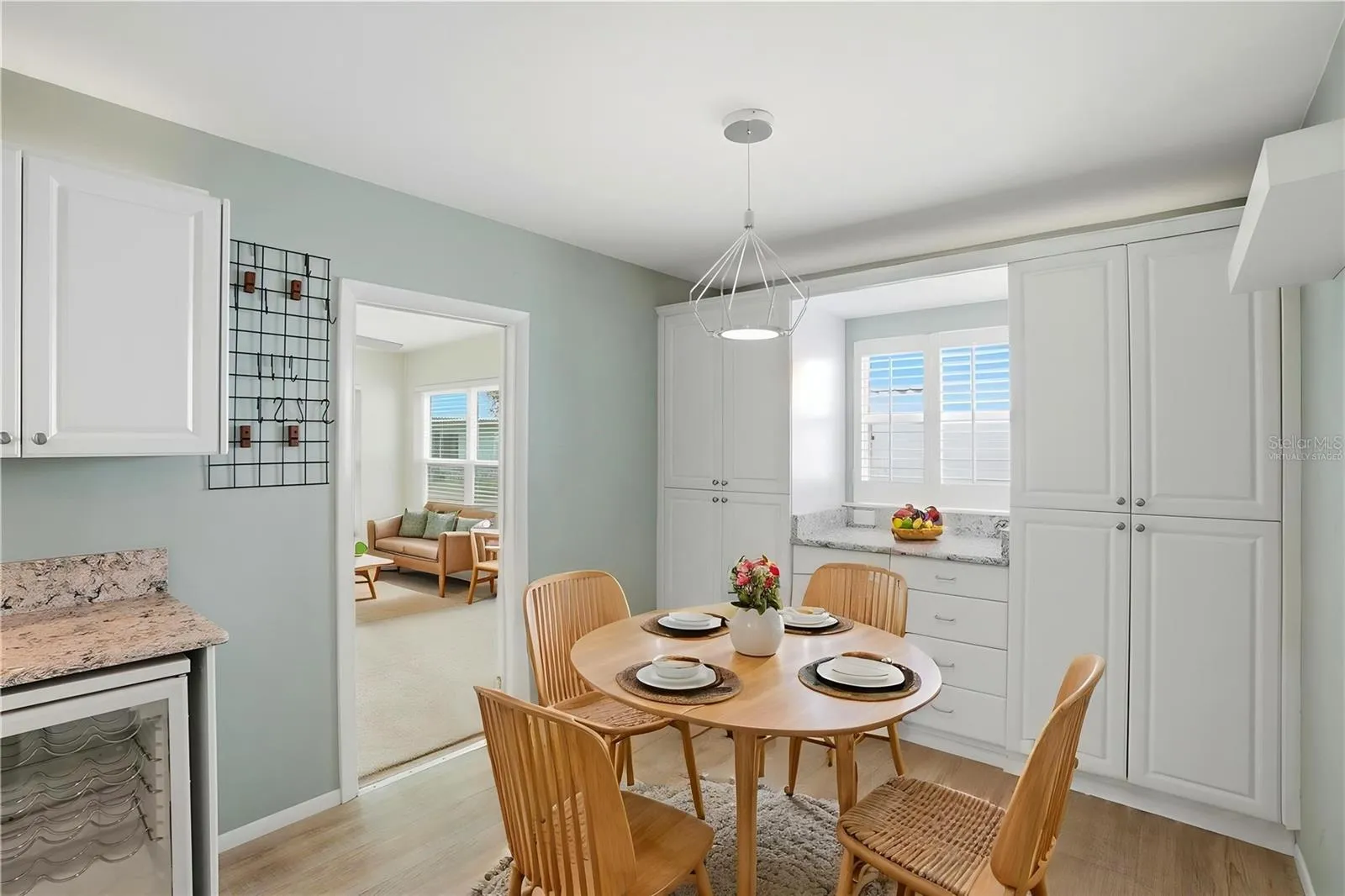 Virtually staged dinette area.