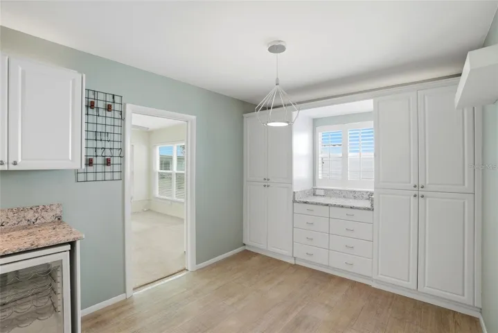 The home office is off of the kitchen.