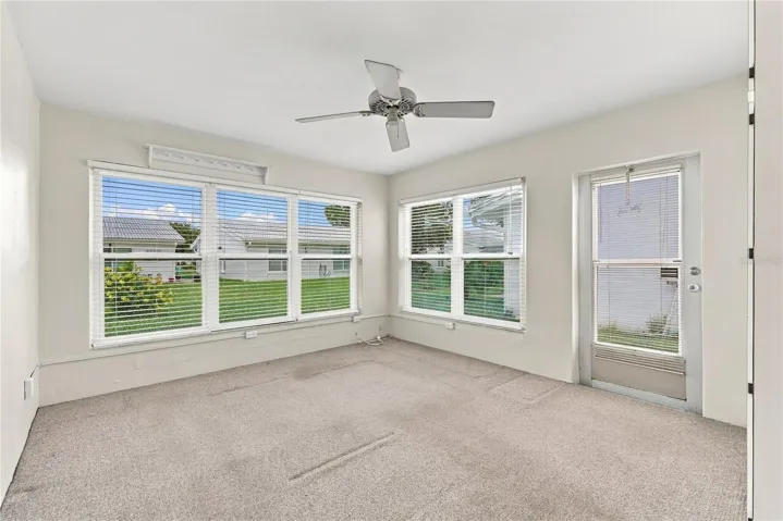 Screened in patio was turned into a bonus room.