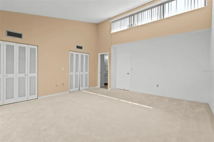 Master bedroom with clerestory windows