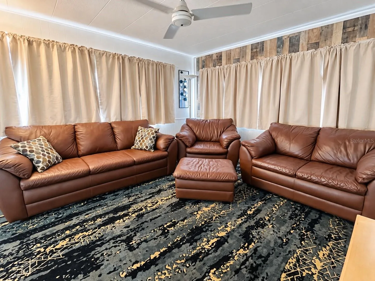 Furniture and curtains and rug as sold with the property.