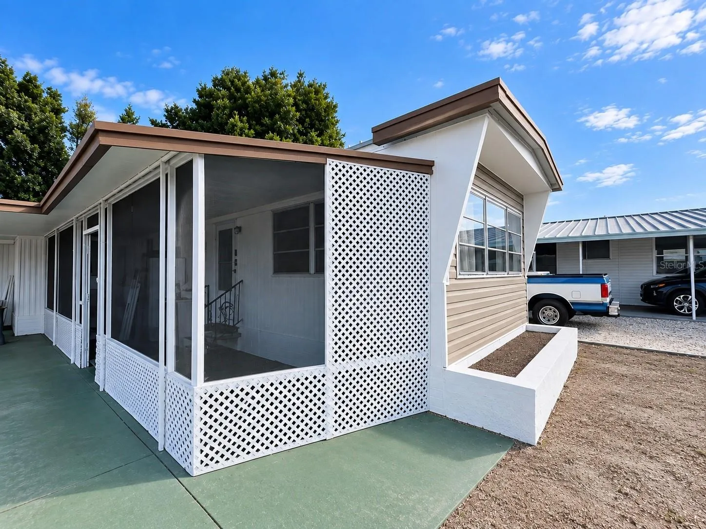 Screen room runs length of home