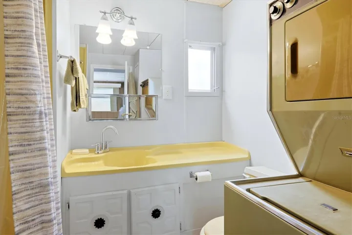 Primary Bathroom/Stackable washer/dryer