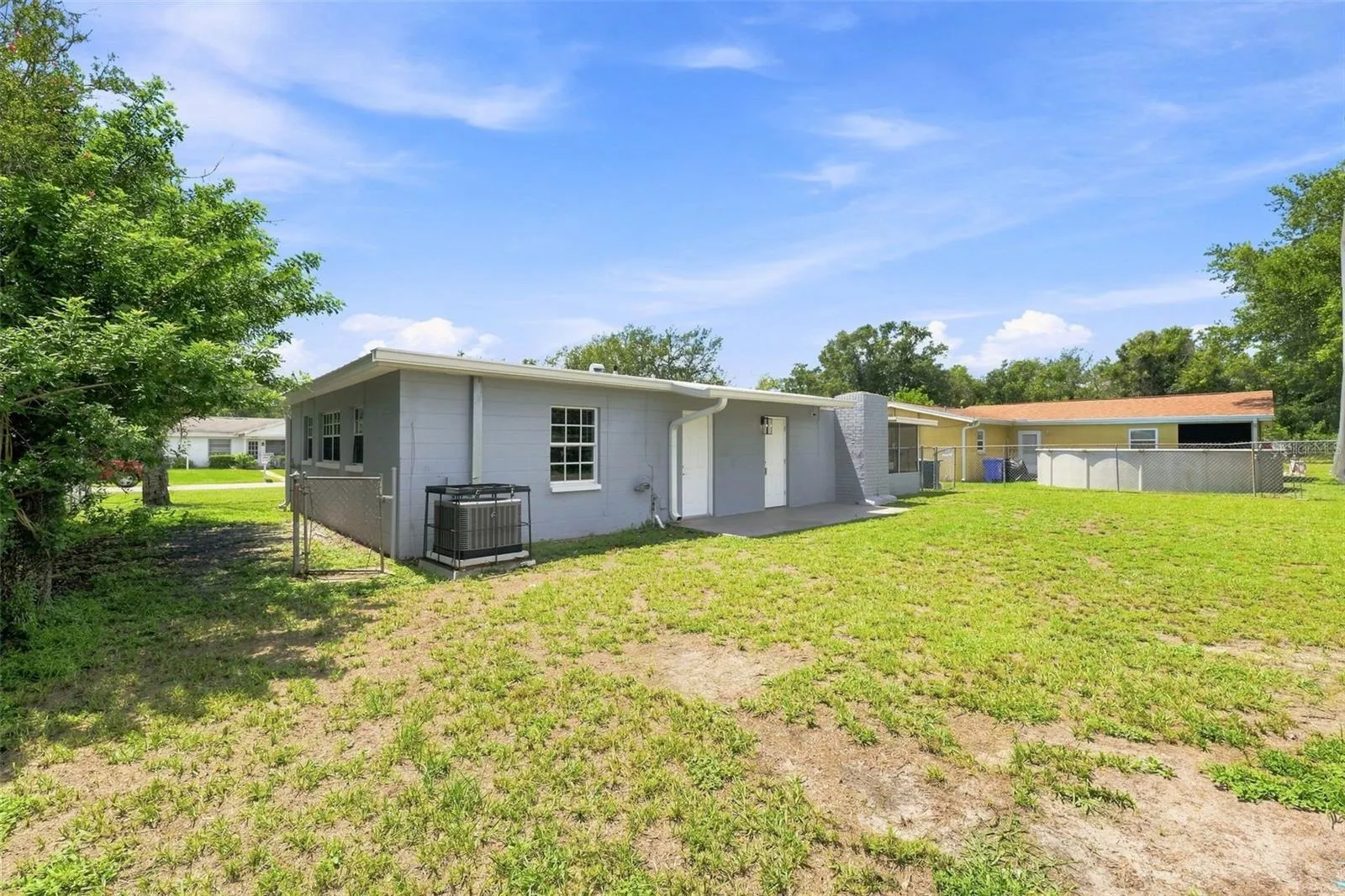 Generously sized, fully fenced backyard perfect for privacy and outdoor activities.