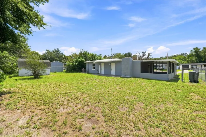Generously sized, fully fenced backyard perfect for privacy and outdoor activities.