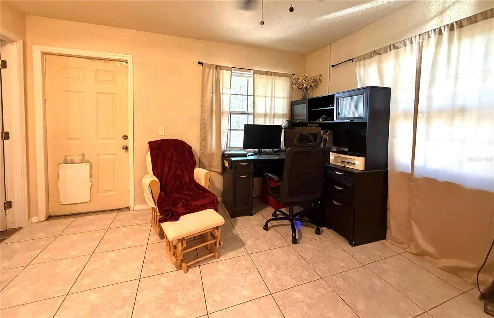 Flex space used as a home office...great for a playroom/den or enclose for a 4th bedroom