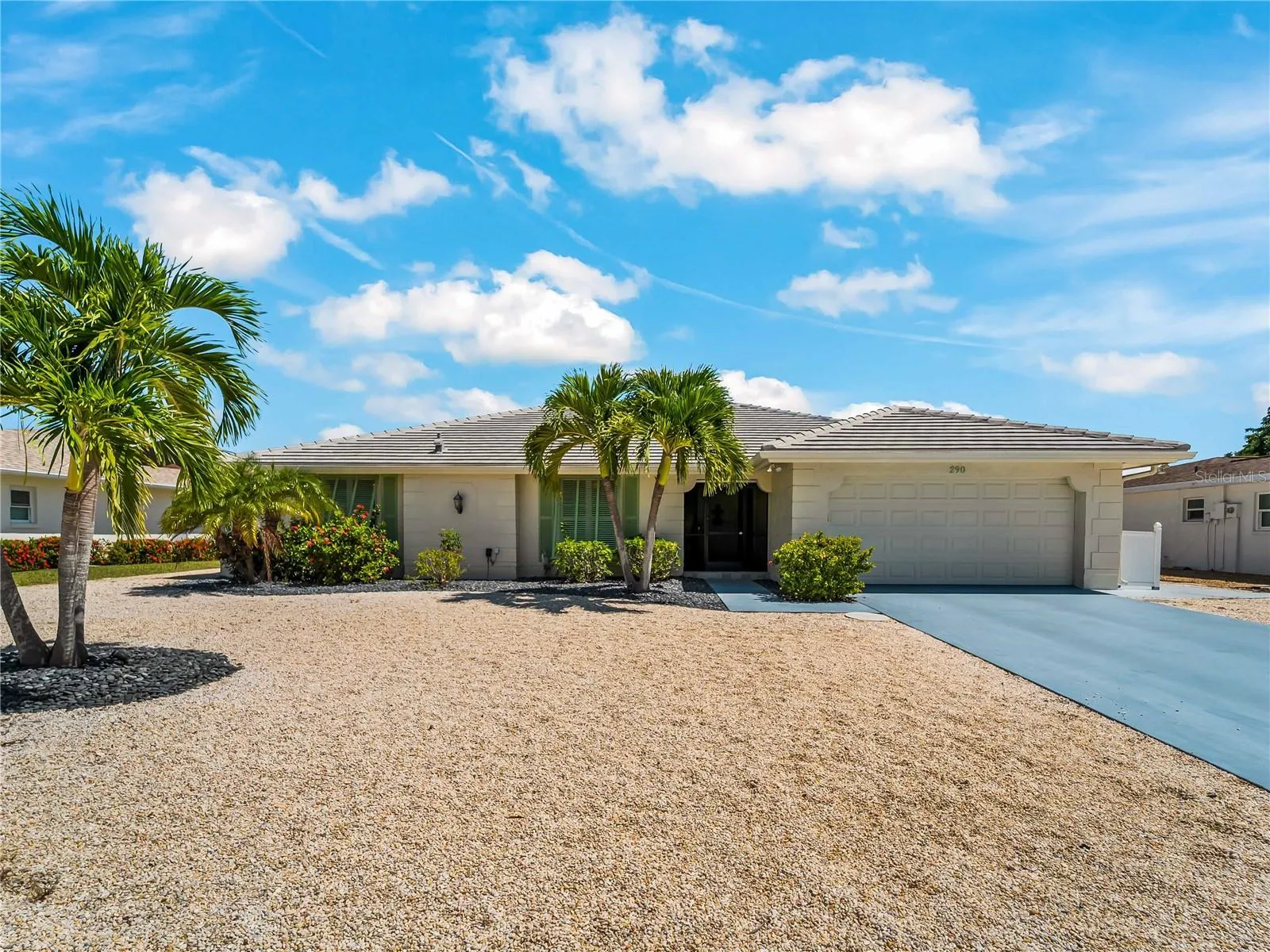 FrontExterior_2903rdStreet_BonitaSprings_TropicalLandscaping_Daylight.jpg