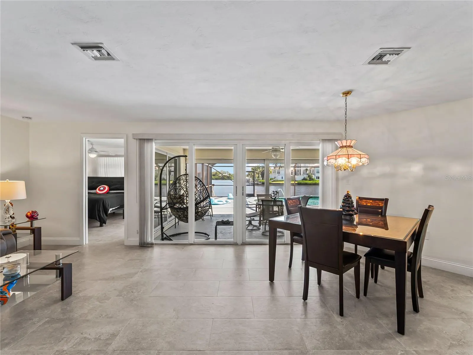 DiningLiving_2903rdStreet_BonitaSprings_OpenConcept_SliderView.jpg