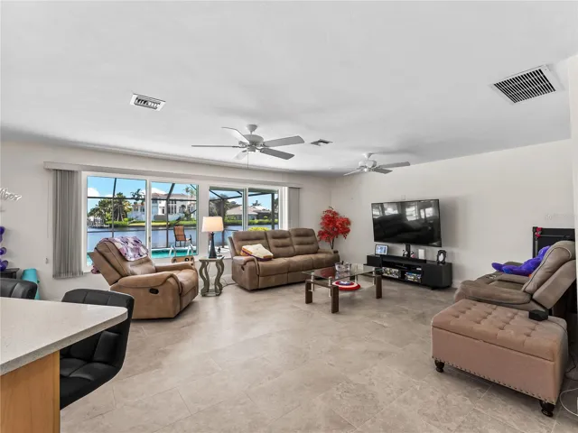 DiningLiving_2903rdStreet_BonitaSprings_OpenConcept_WindowView.jpg