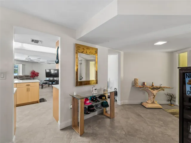 KitchenGreatRoom_2903rdStreet_BonitaSprings_OpenConcept_Entry.jpg