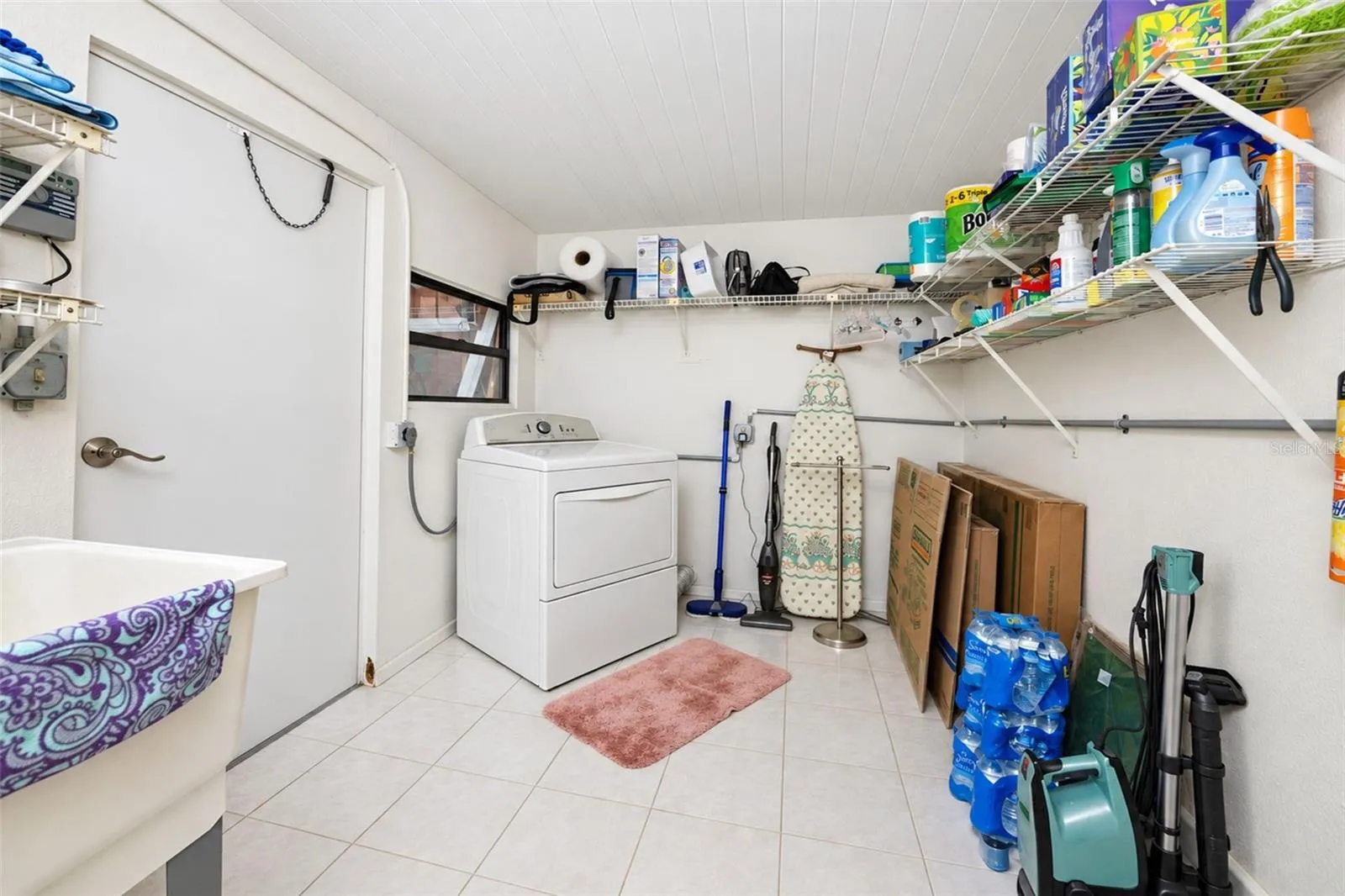 Kenmore washer and dryer plus utility tub are all in place.