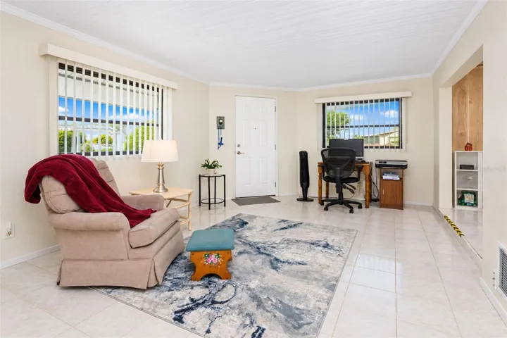 The family room would be perfect for a TV room, an office or just extra seating!