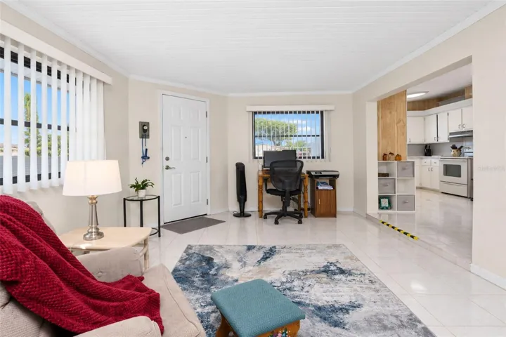 Family room has tiled flooring for easy maintenance!