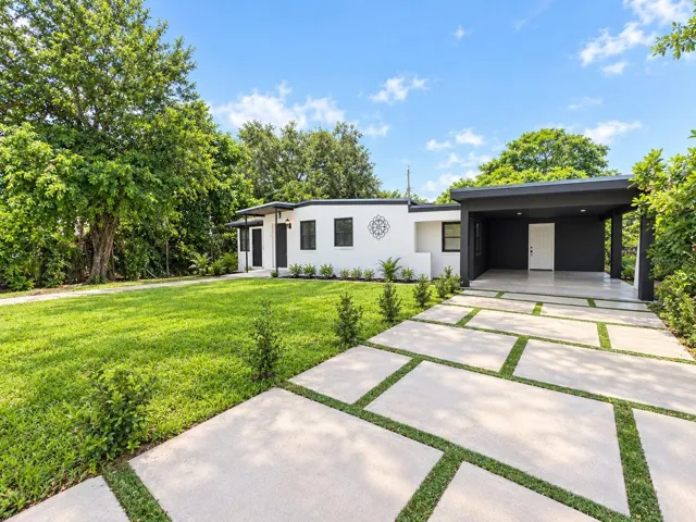 Front yard &amp; paved driveway &amp; carport