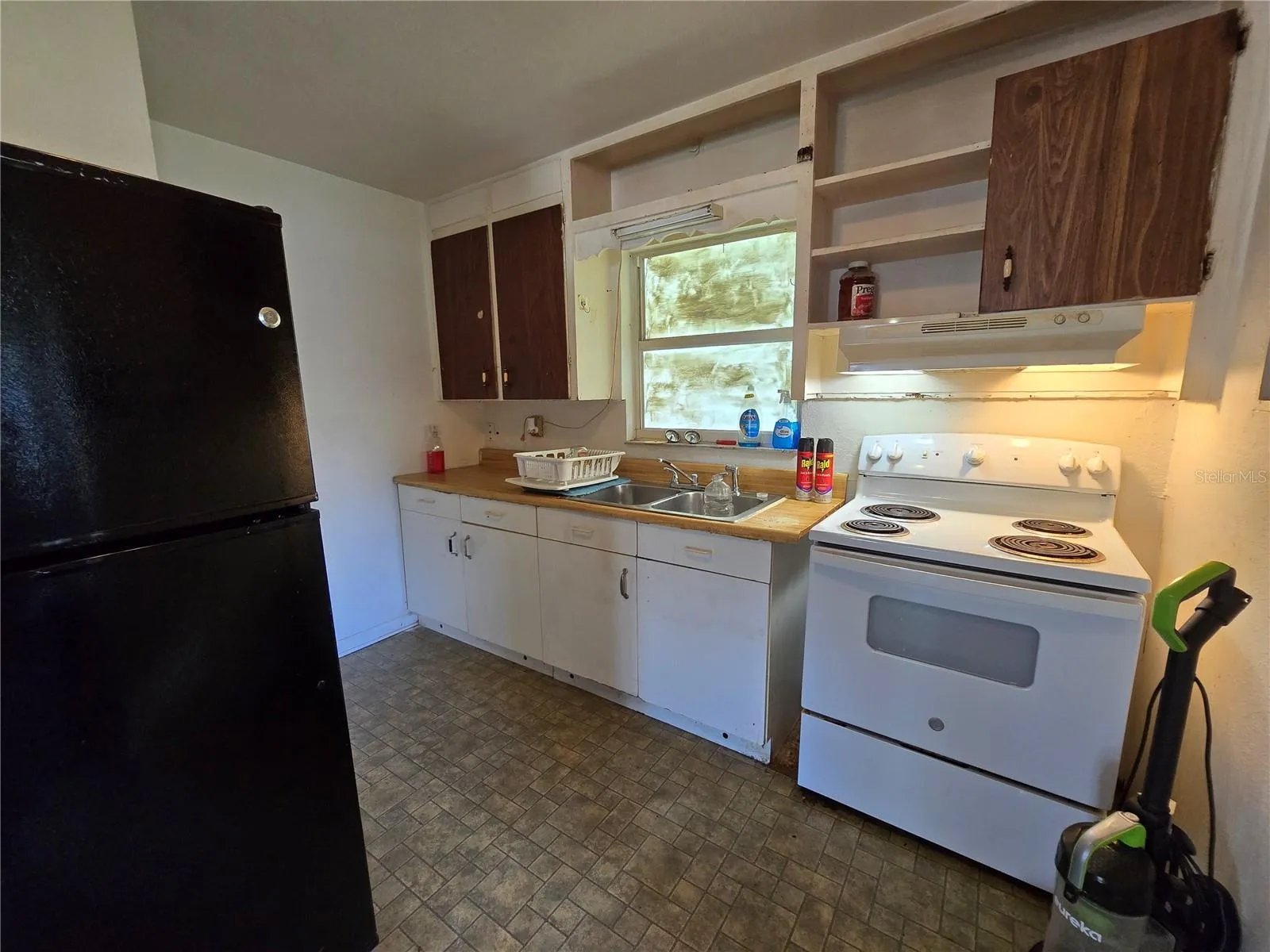 Kitchen with view of the backyard