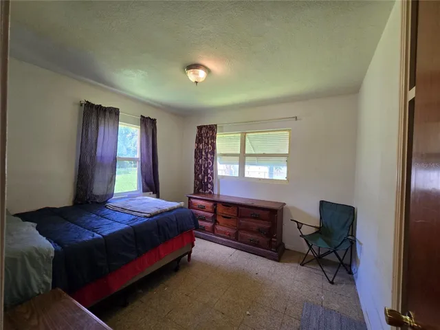 Bedroom 2 overlooks backyard
