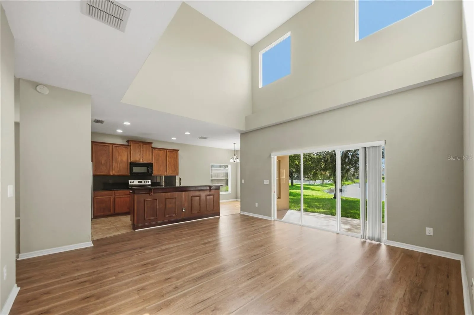 Open floor plan opens onto covered patio