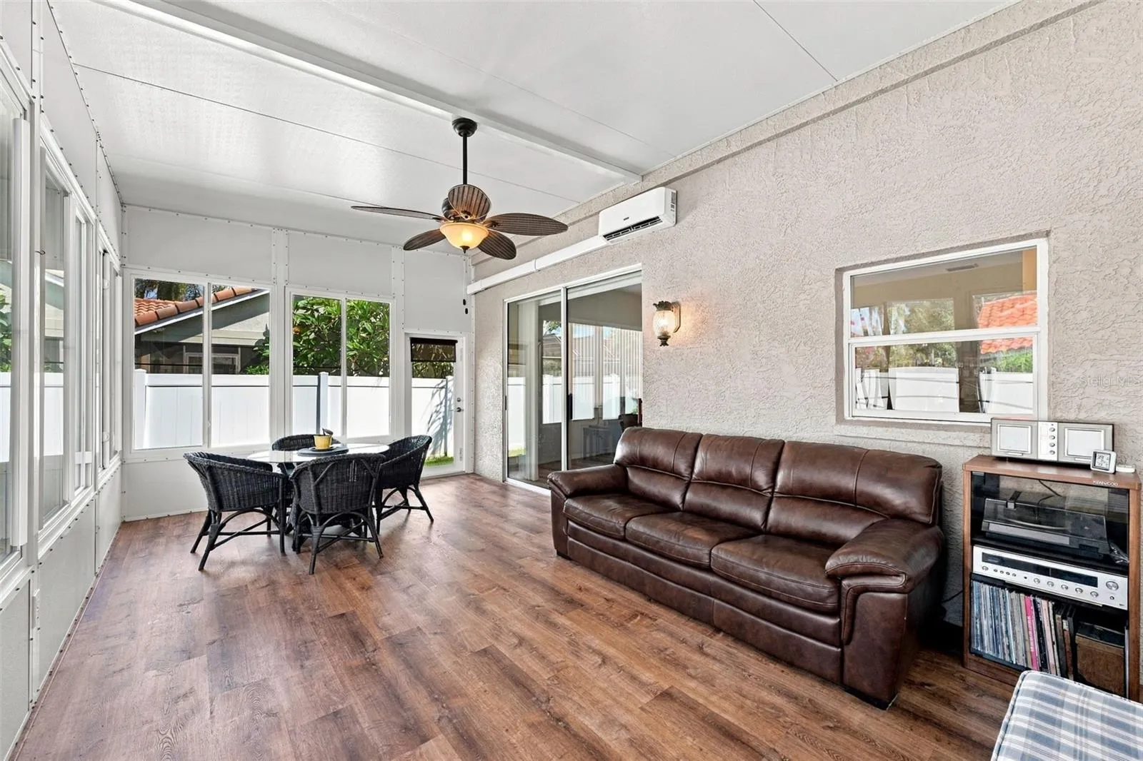 Sunroom with hurricane rated doors and sliding windows