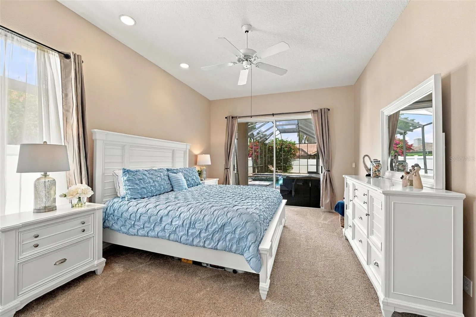 Primary bedroom with access to pool