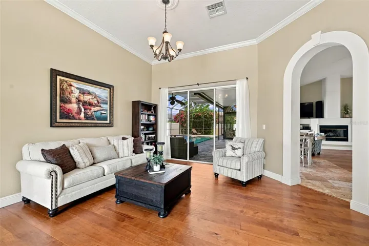Living room with pool views