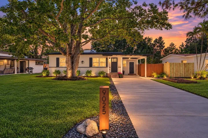 Attention to detail with landscaping and lighting.