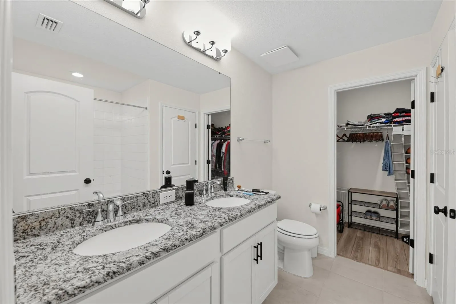 Primary Bathroom and walk-in closet