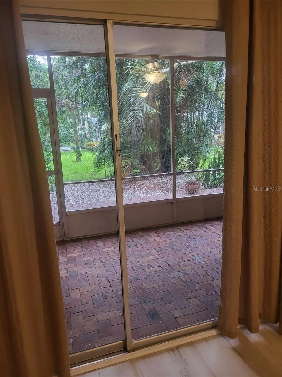 Screened-In Lanai Off Of The Living Room